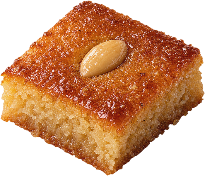 A square of golden basbousa with a glossy syrup top and one blanched almond